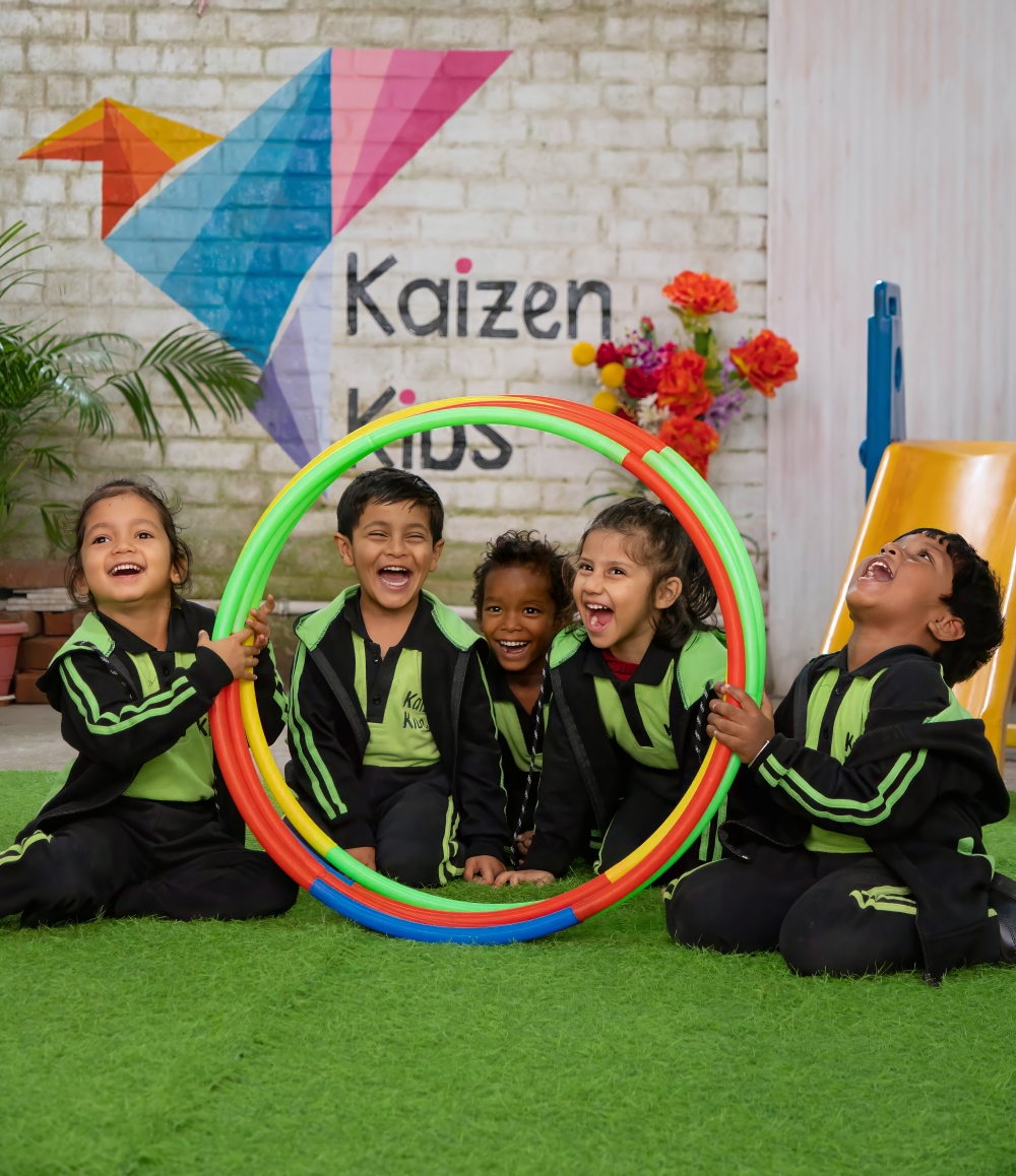 Students of Kaizen Kids playing with some rings