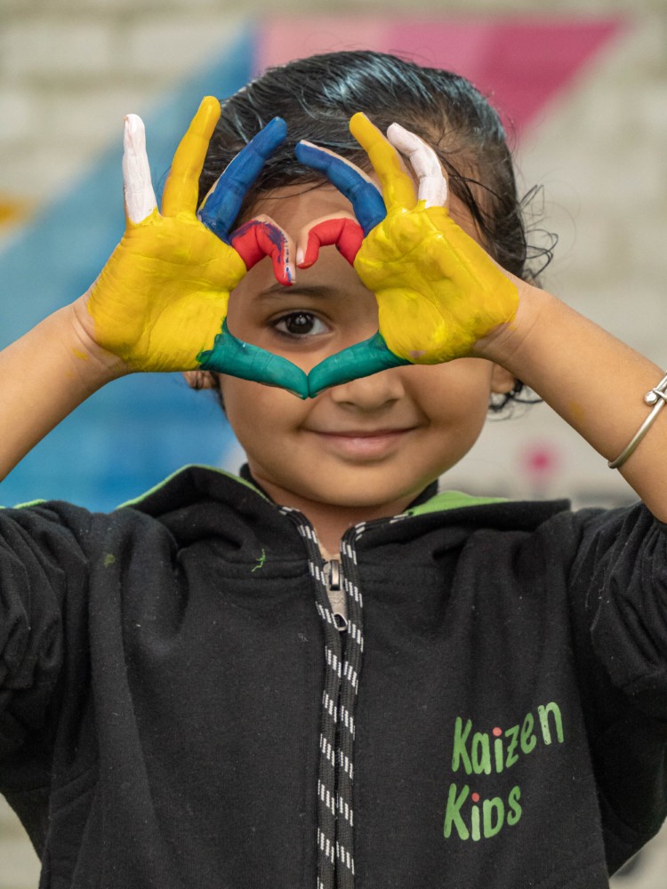 Students of Kaizen Kids playing with some rings